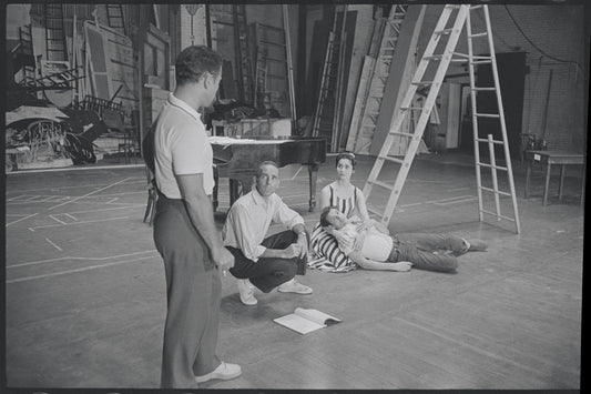 Arthur Laurents and Jerome Robbins rehearse death scene with Larry Kert and Carol Lawrence for the stage production West Side Story