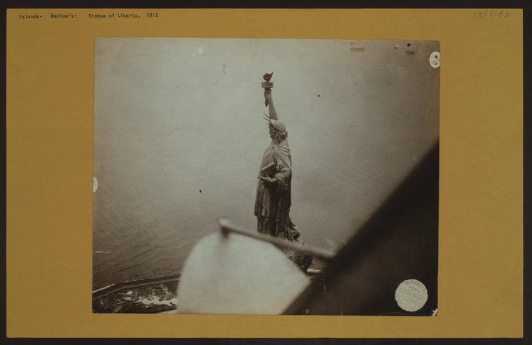 Islands - Bedloe's Island - [View of the Statue of Liberty from a hydroplane, driven by aviator Coffyn.]