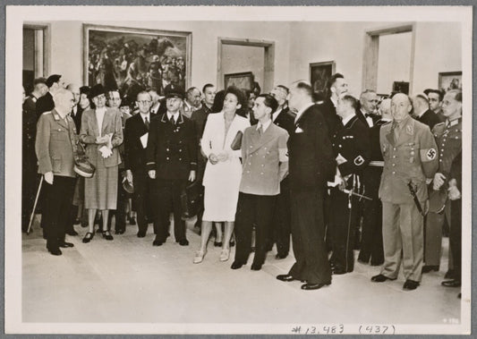 In the House of German Art in Munich the "Great German Art Exhibition 1942" was opened by Reich Minister Dr. Goebbels.  Dr. Goebbels during the first tour of the exhibition; to his left, Frau Prof. Troost; far left, Prime Minister Siebert.