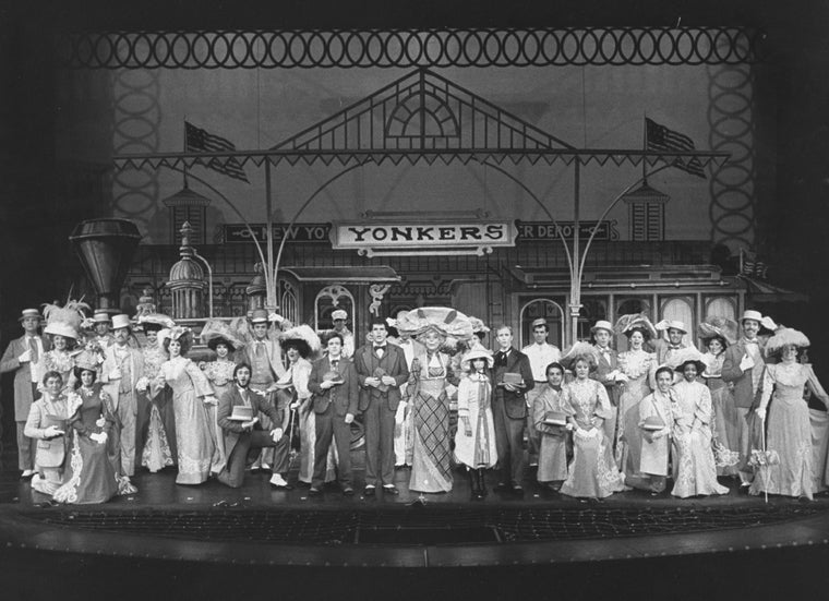 Carol Channing (C) with cast in a scene from the revival tour of the Broadway production of the musical "Hello, Dolly!"