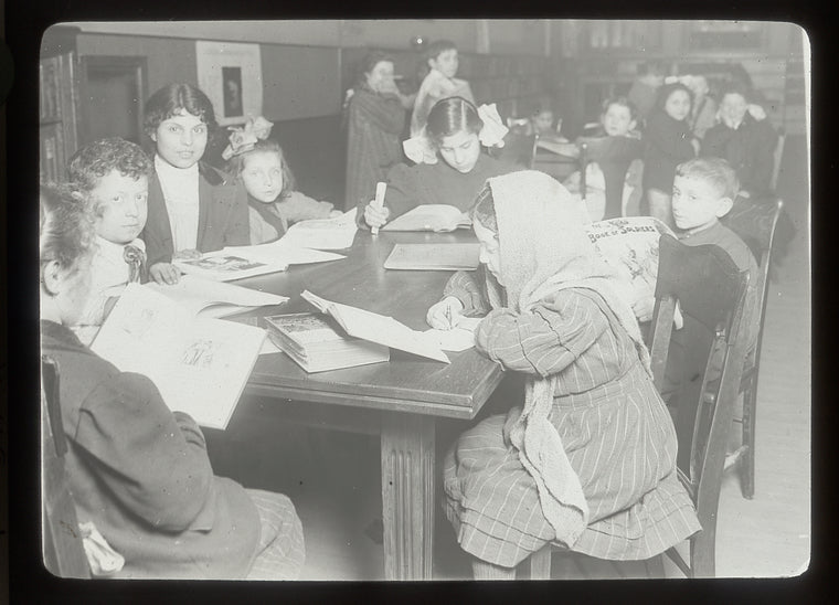 Chatham Square Branch, children copying a Mother Goose Rhyme in Children's Reading Room