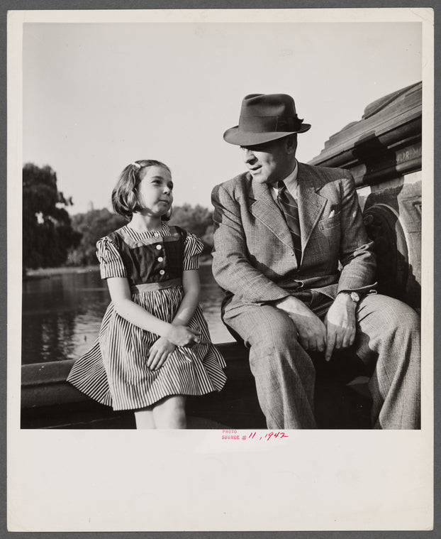 New York, New York. Dr. Winn [or Wynn], a Czech-American, telling Janet a tall story in Central Park.