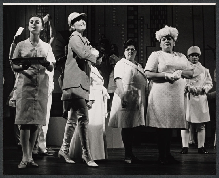 Marlyn Mason [second from left in foreground] and unidentified others in the stage production How Now Dow Jones