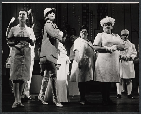 Marlyn Mason [second from left in foreground] and unidentified others in the stage production How Now Dow Jones