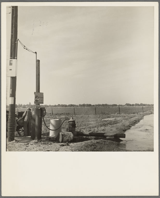 Irrigation pump on edge of field. Electric power typical of San Joaquin Valley farming. California