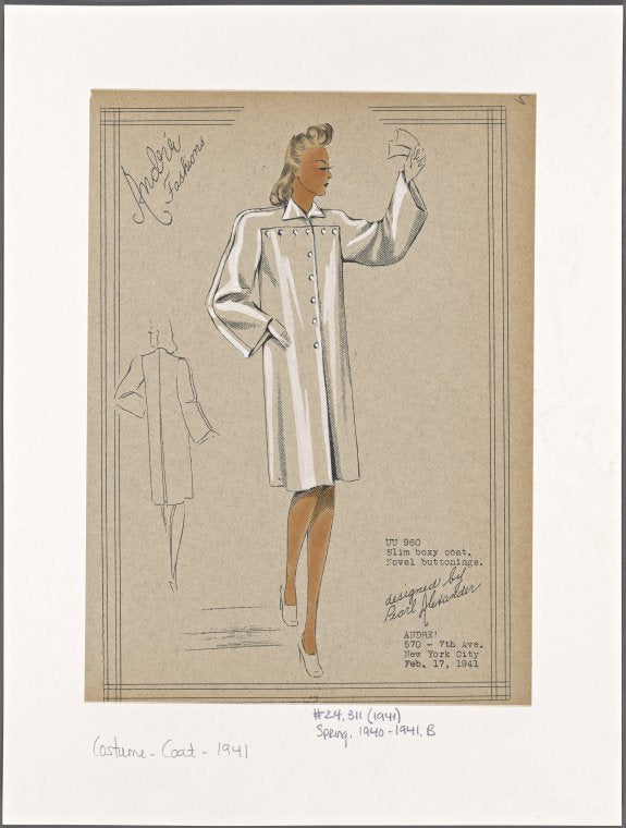 Slim boxy coat with buttons in a T-shape.