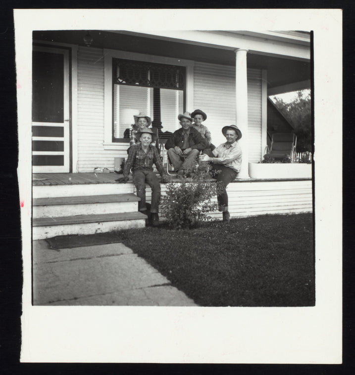 Bing Crosby and boys on a porch