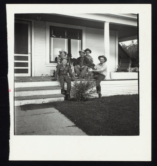 Bing Crosby and boys on a porch