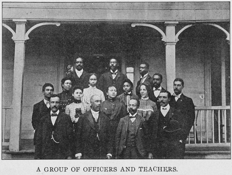 A group of officers and teachers.