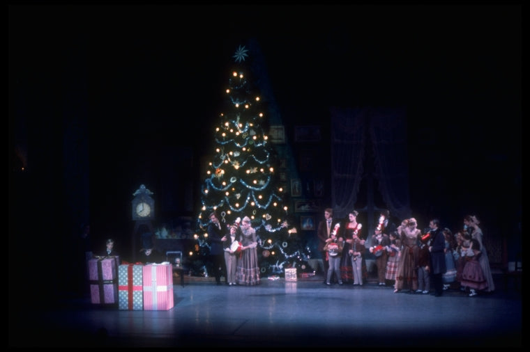Arrival of Drosselmeyer and his nephew with gifts, in a New York City Ballet production of "The Nutcracker" (New York)