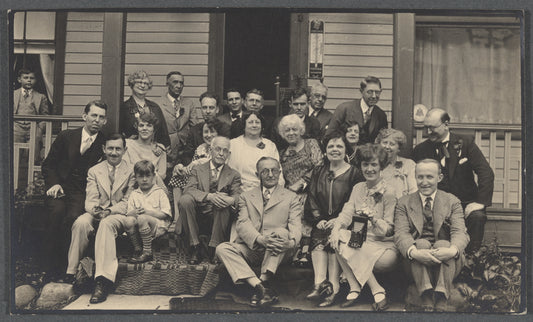 Magicians and family on the steps of the Hotel Rouclere