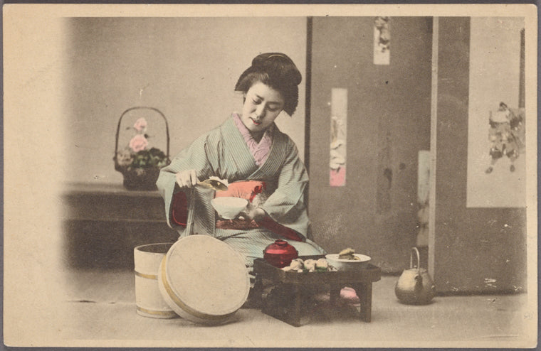 Woman dishing rice into bowl.