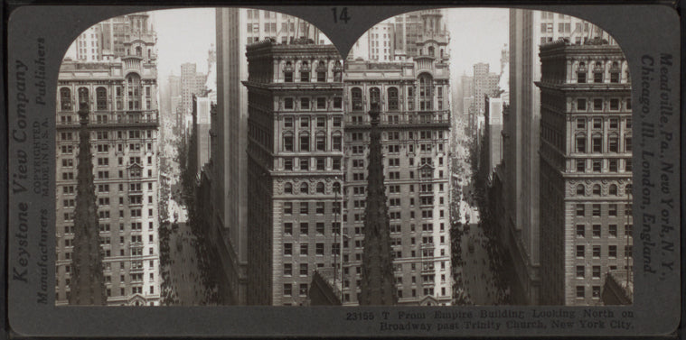 From Empire Building looking north on Broadway past Trinity Church, New York City.