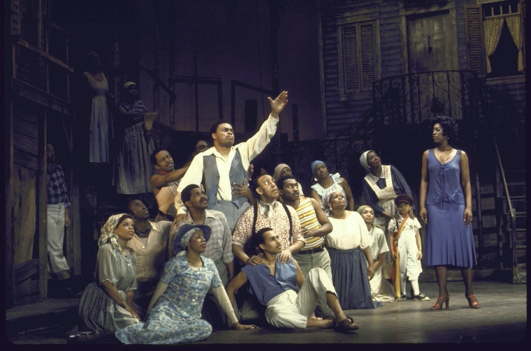 Actors (standing) Donnie Ray Albert & Clamma Dale w. cast members in a scene fr. the Houston Grand Opera production on Broadway of the opera "Porgy And Bess." (New York)