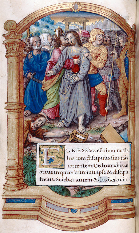 Full page miniature of the betrayal of Christ by Judas; in the background Peter sheathes his sword, as Malchus lies on the ground with blood streaming from his ear