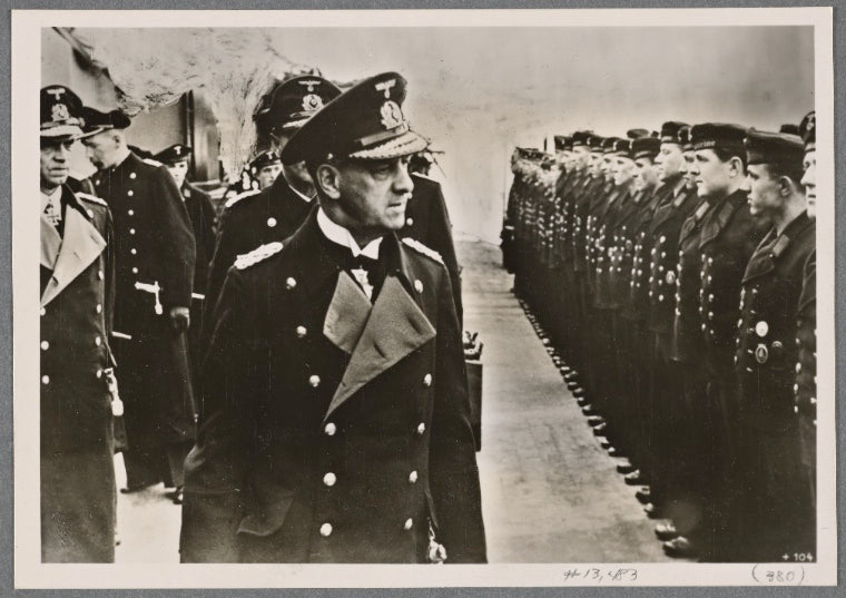 The Commander-in-chief of the Navy, Grand admiral Dr. h.c. Raeder, inspects the fighting forces who took part  in the "Channel Dash" and expresses his appreciation to the officers and commander of the battleship "Scharnhorst".