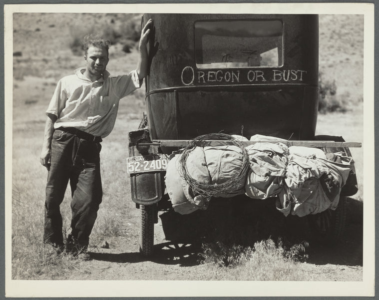 Vernon Evans (with his family) of Lemmon, South Dakota, near Missoula, Montana on Highway 10. Leaving grasshopper-ridden and drought-stricken area for a new start in Oregon or Washington