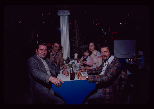 Group portrait with Milton Karas [far left?], Owner, Plaza de Athena II