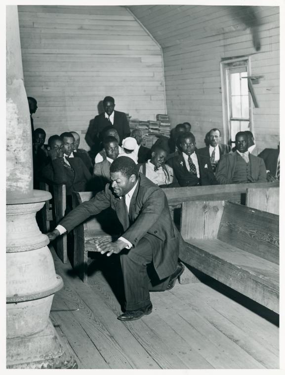 Singing "Trying to Make a Hundred, Ninety-Nine and a Half Won't Do" during the collection at Negro church in Heard County, Georgia.