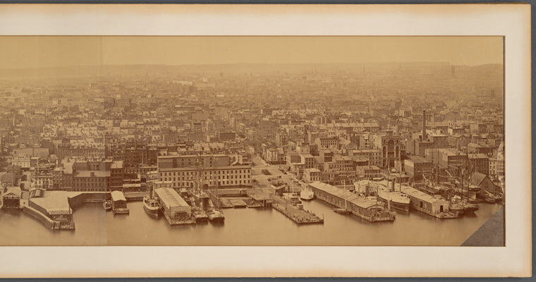 Panoramic view of Manhattan, showing Brooklyn Bridge under construction