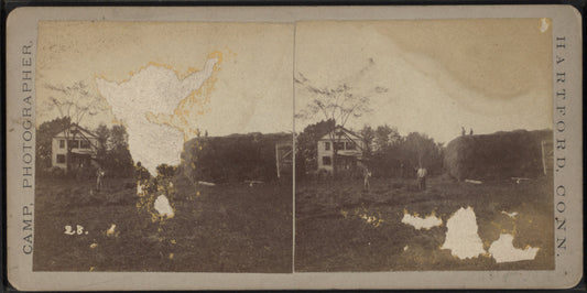 A farm scene showing men stacking hay.