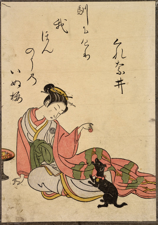 Seated lady playing with dog