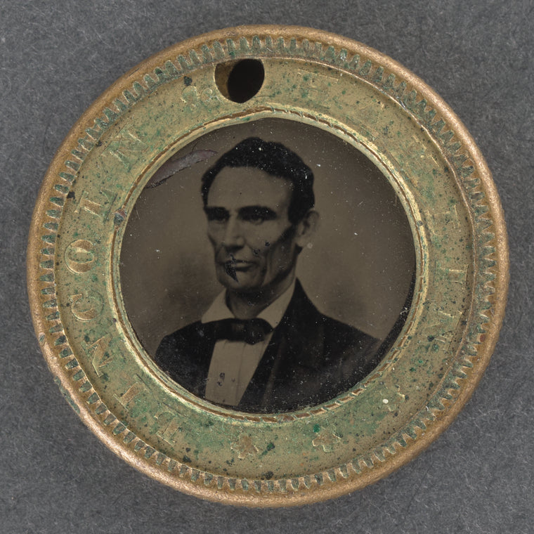 [Lincoln 1860 button]