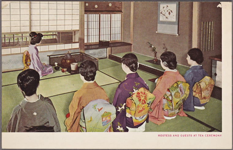Hostess and guests at tea ceremony.