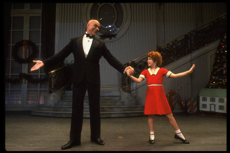 Bridget Walsh as Annie and Harve Presnell as Daddy Warbucks in a scene from a touring company of the musical "Annie."