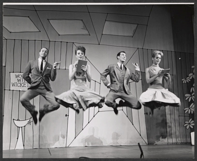 Dancers in the stage production How to Succeed in Business Without Really Trying