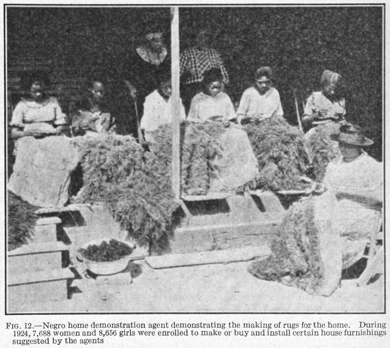 Negro home demonstration agent demonstrating the making of rugs for the home; During 1924, 7,688 women and 8,656 girls were enrolled to make or buy and install certain house furnishings suggested by the agents.