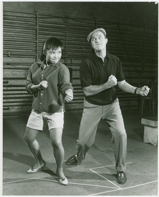 Pat Suzuki (Linda Low) and Gene Kelly (director) in rehearsal for Flower Drum Song