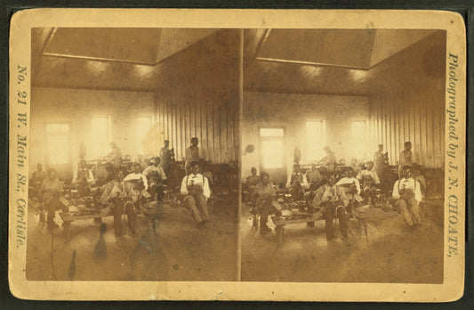 Native American students in a workshop at the United States Indian Industrial Training School.