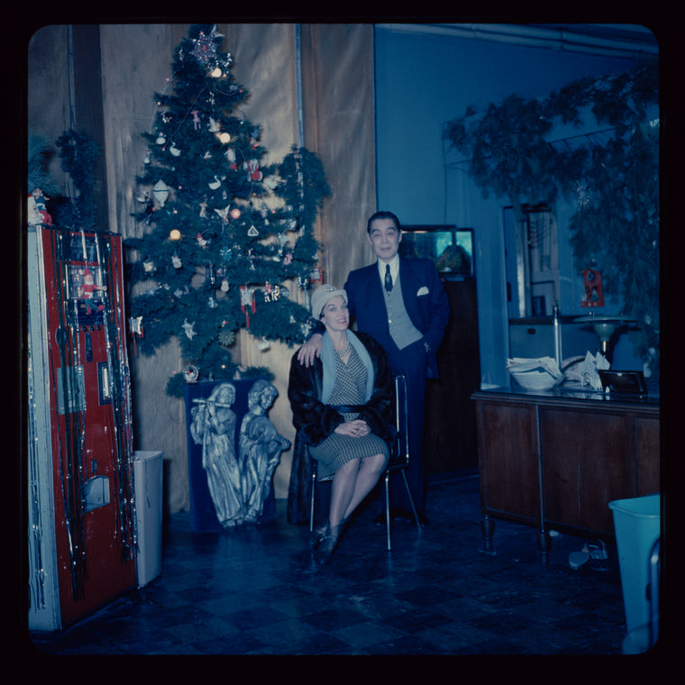 Lisan Kay and Yeichi Nimura with Christmas decorations, likely in their Carnegie Hall studio
