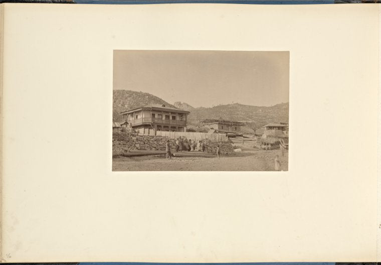 Local people in front of houses