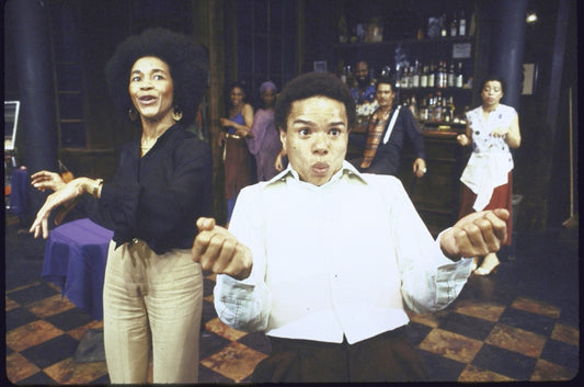 Actors Mary Alice and Reyno with cast members in a scene from the New York Shakespeare Festival production of the play "spell #7." (New York)