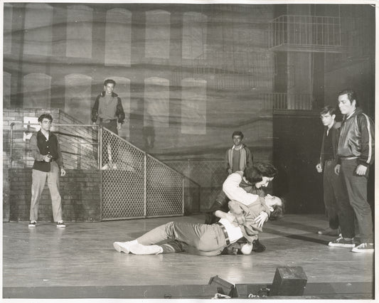 Carol Lawrence, Larry Kert, and ensemble in the stage production West Side Story