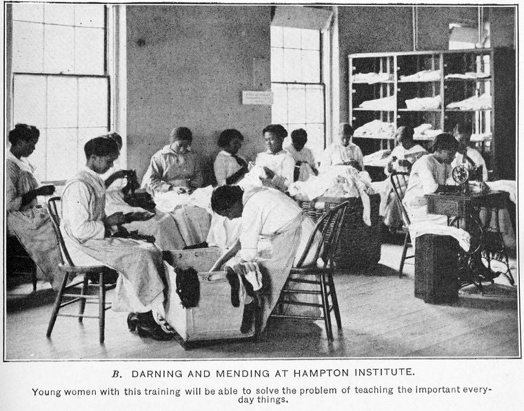 Darning and mending at Hampton Institute.