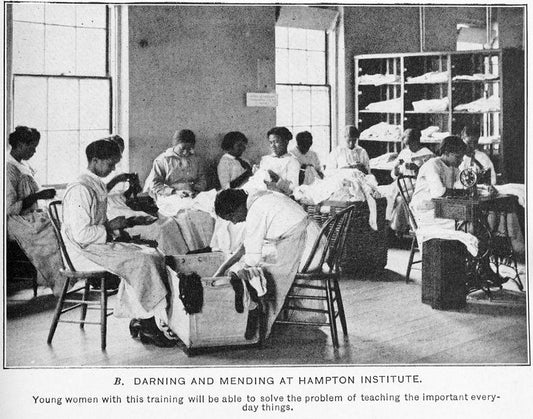 Darning and mending at Hampton Institute.