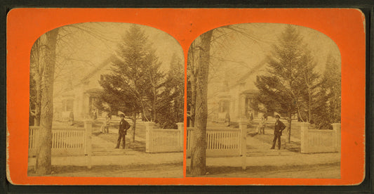 Group of people in the garden in front of their home.