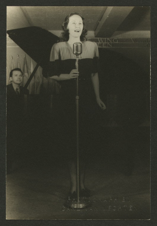 Lucy Monroe, with Donald Angus at piano, at the Stage Door Canteen