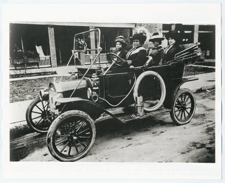 Madam C. J. Walker driving a car