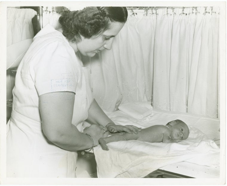 Infant Incubator - Nurse drying baby
