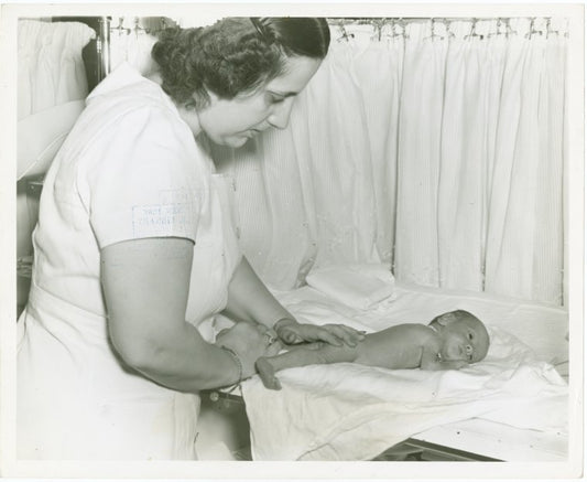 Infant Incubator - Nurse drying baby