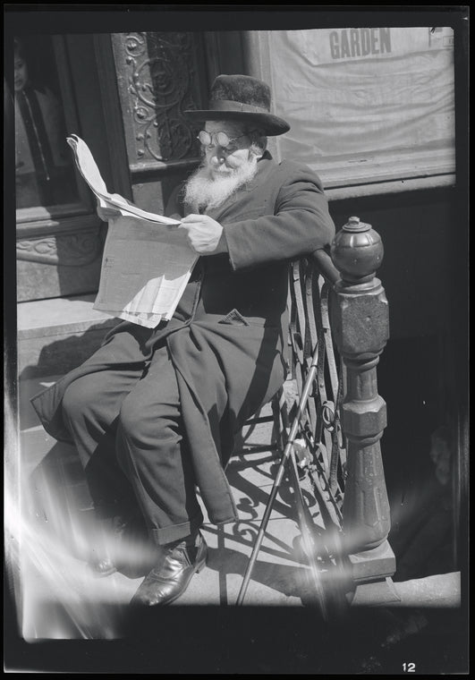 Man reading newspaper