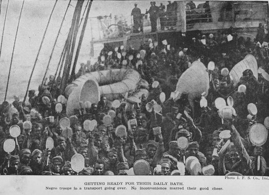 Getting ready for their daily bath; Negro troops in a transport going over; No inconvenience marred their good cheer.