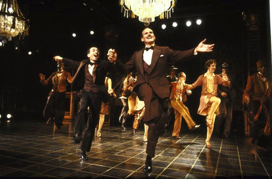 Actors (Front L-R) Chip Zien & David Carroll w. cast in a scene fr. the replacement cast of the Broadway musical "Grand Hotel." (New York)