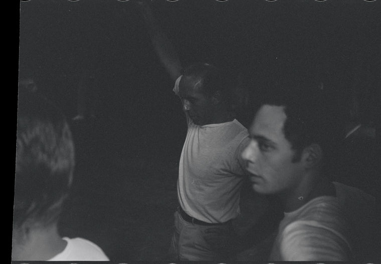 Jerome Robbins directing dancers in rehearsal for the stage production West Side Story