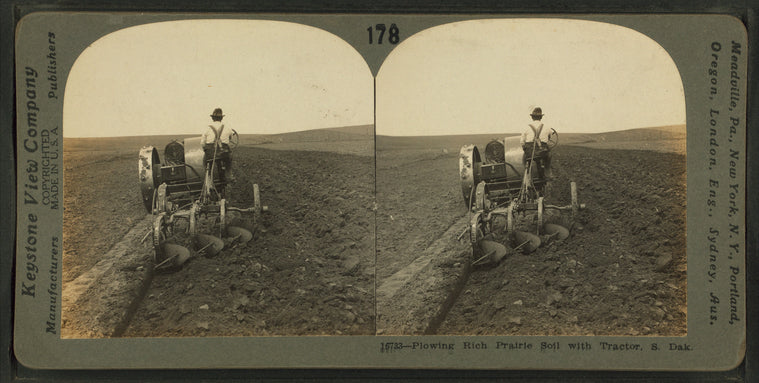 Plowing rich prairie soil with tractor, S. Dak.