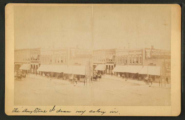 Street view of Salina, including drug store.